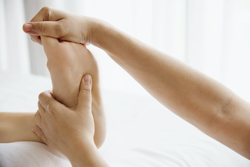 A foot being massaged