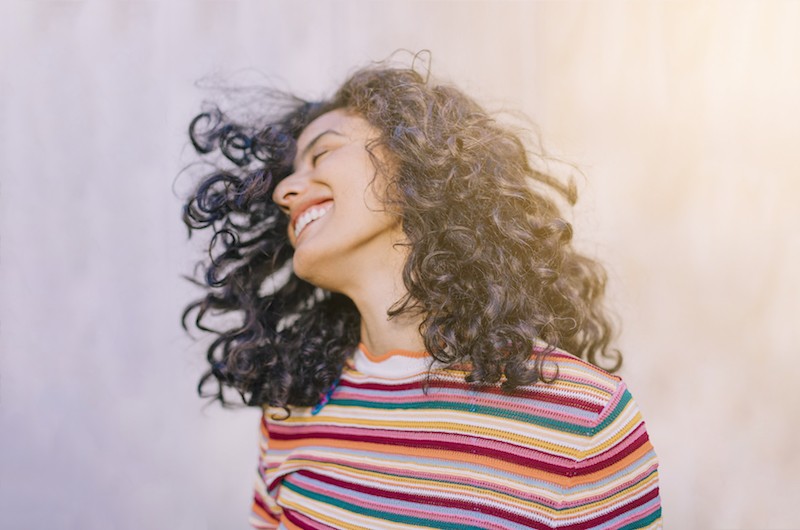 Woman happy and dancing