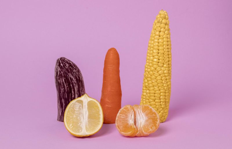 Abstract sexual anatomy arrangement with fruit