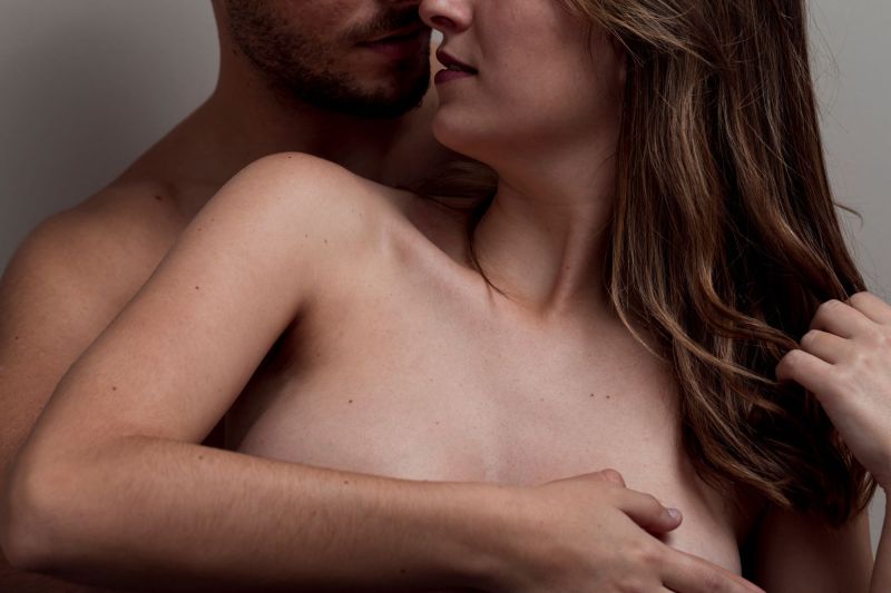 Close up couple hugging naked