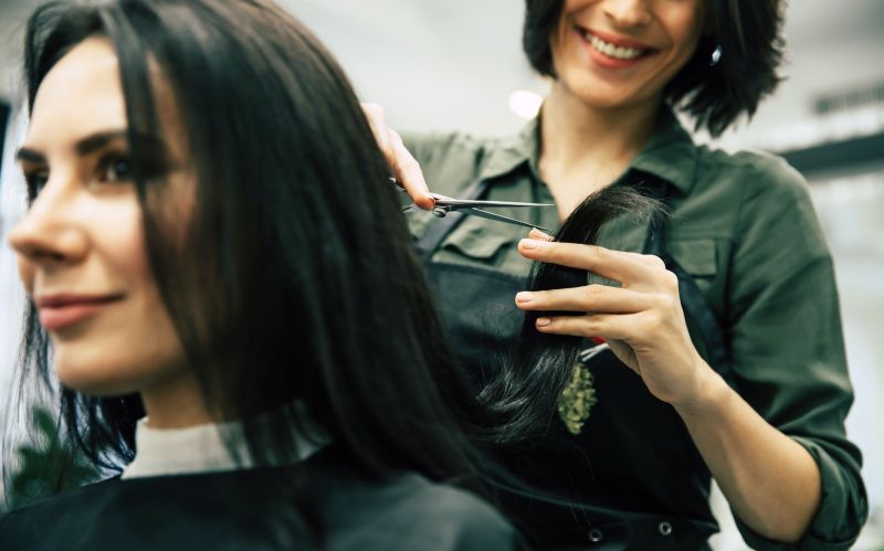 Close up woman smiling getting haircut