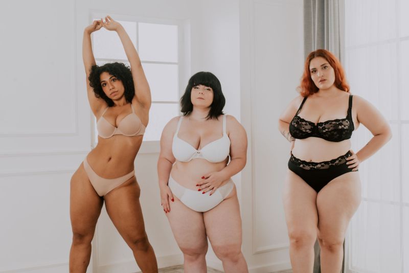Confident women posing in lingerie