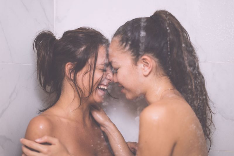 Couple laughing in shower together