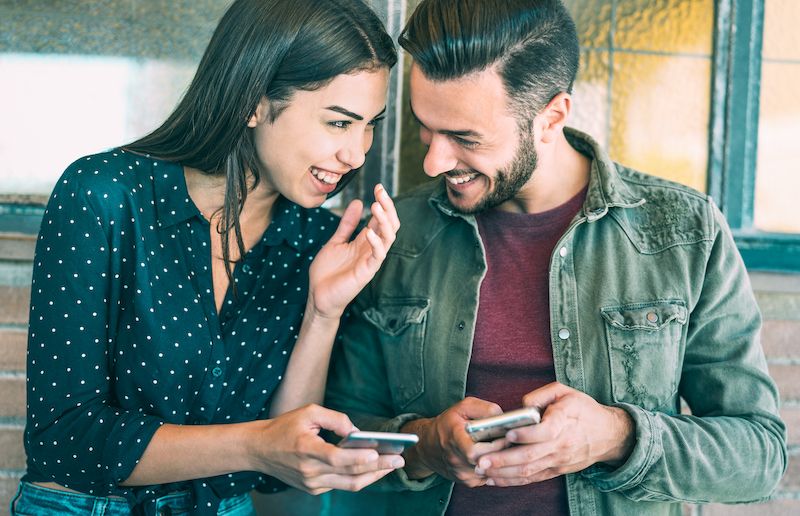 Couple checking their sexting chats