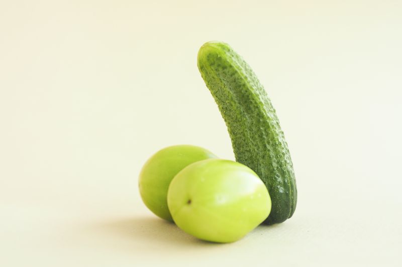 Cucumber and tomatoes penis concept