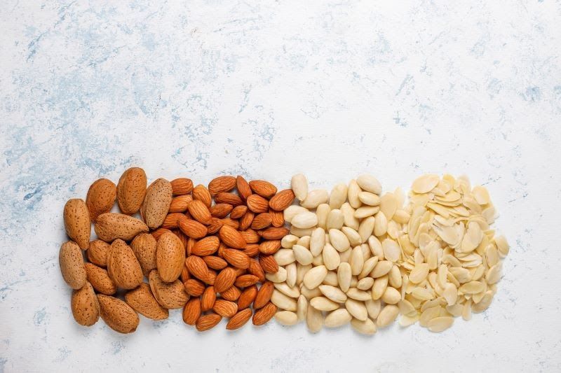 Different types of almonds on a table