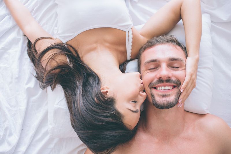 Happy couple in bed
