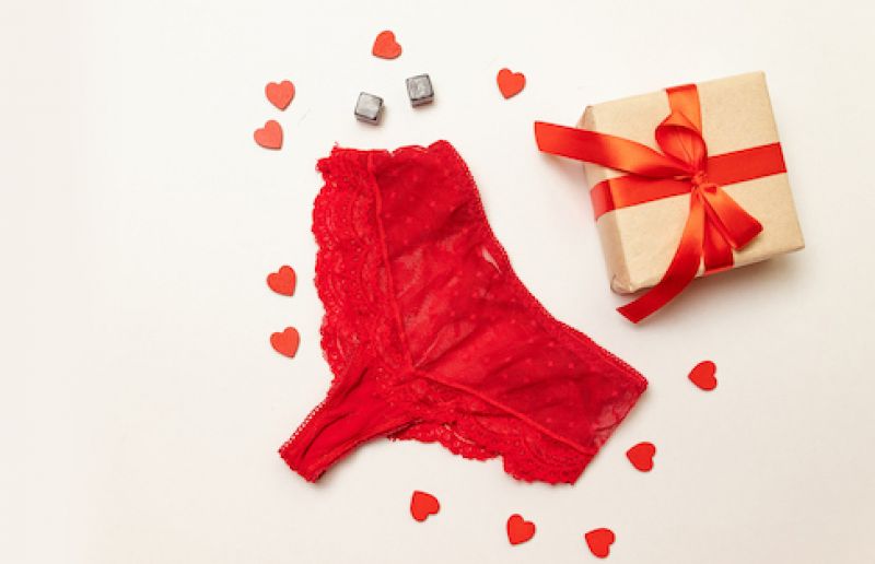 Red lace panties with romantic box of gifts