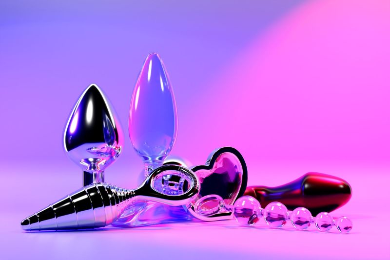 Sex and anal toys on purple background