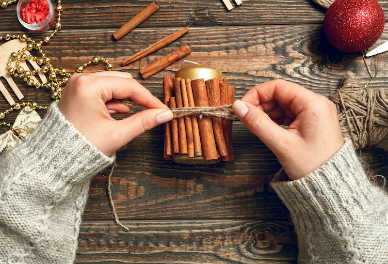 Woman making homemade festive candle