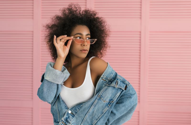 Woman posing in sunglasses