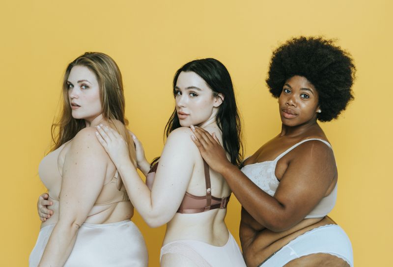 Woman posing together in natural underwear