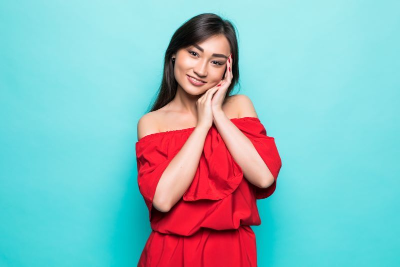 Young woman in red dress