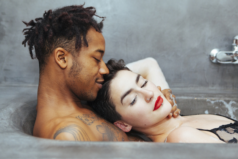 Romantic couple in the bath at home